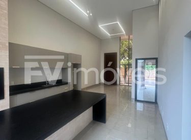 sala de estar e cozinha gourmet conjulgada